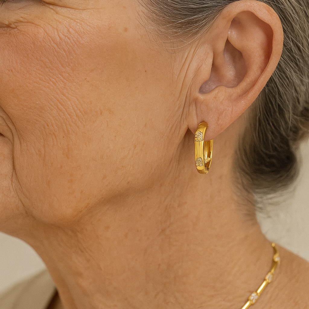 Vintage øreringe med blomst i guld